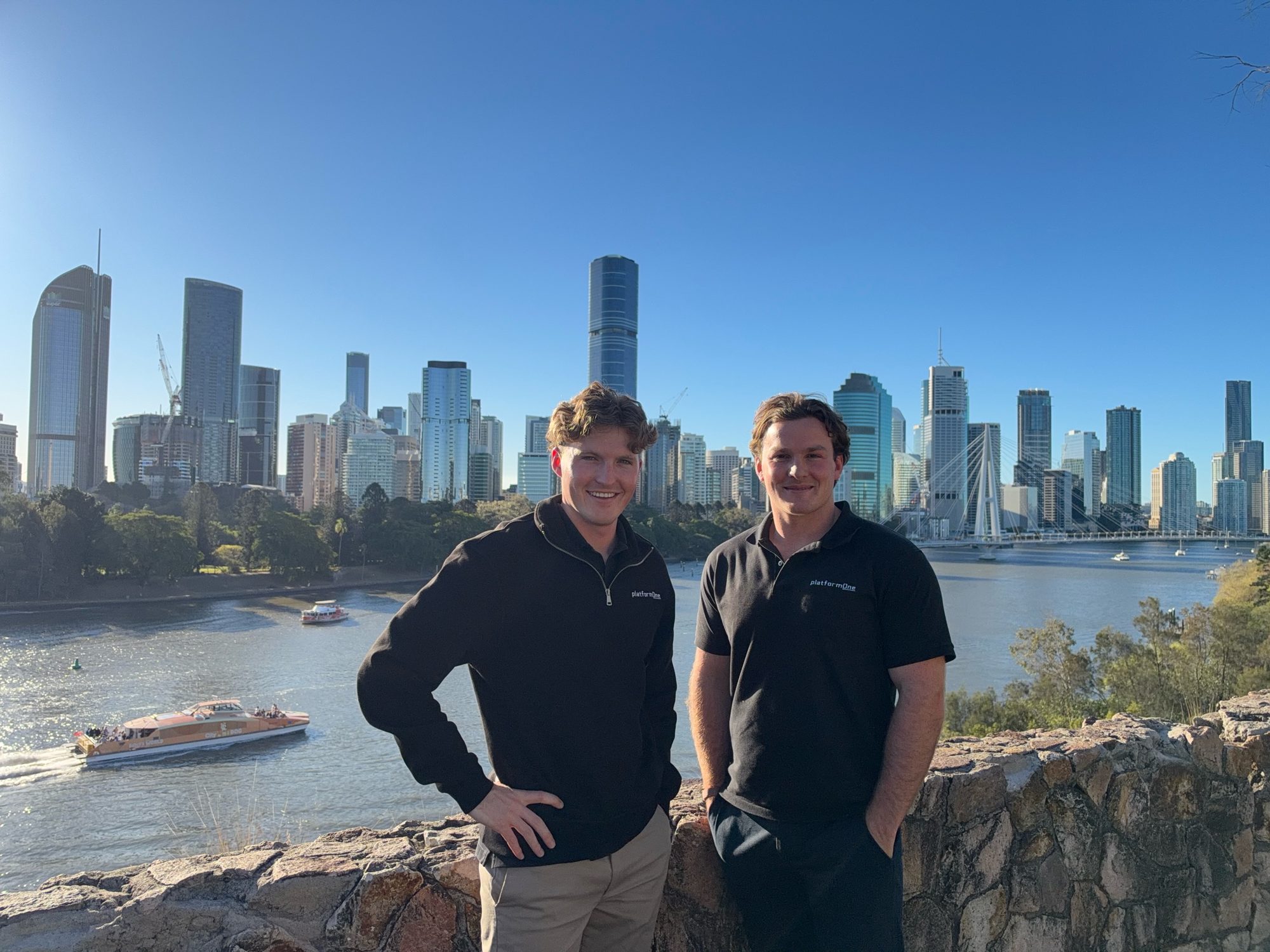 Jack Pate and Lachlan Kosanic at a lookout above the Brisbane River